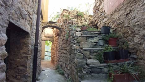 Old-italian-alley-made-from-stone-with-sunset-in-the-background