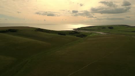 The-famous-Cuckmere-Valley-in-East-Sussex-between-Eastbourne-and-Newhaven,-now-a-sea-flooded-vale-with-large-meanders-and-developing-oxbow-lakes