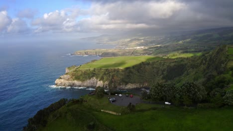 Small-parking-lot-lookout-overlooking-cliff-coasts-after-storm,-Azores