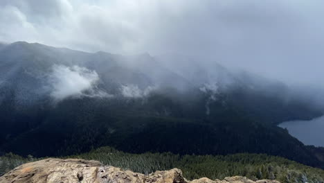 Clouds-And-Fog-Over-The-Pine-Tree-Forest-From-Mount-Storm-King-Summit-Within-The-Olympic-National-Park-In-Washington,-USA