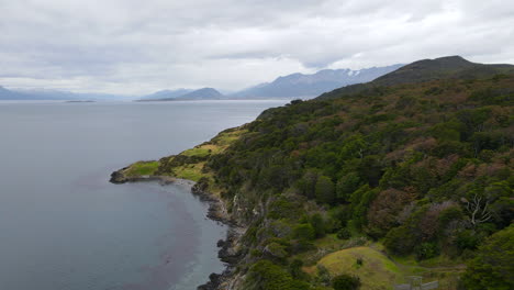 Drone-flying-forward-over-the-coast-of-Ushuaia-Patagonia-Argentina,-next-to-Beagle-Channel