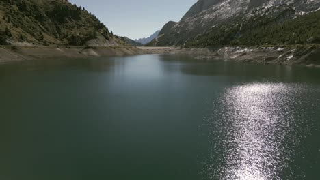 Drone-footage-over-a-lake-on-dolomites-in-Italy-1