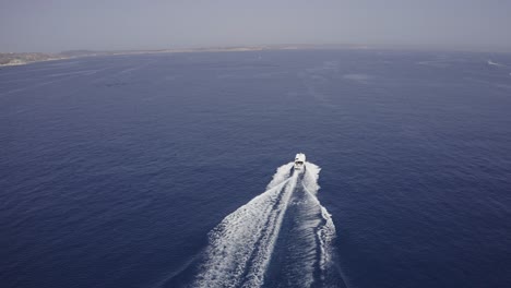 Aerial-Of-Boat-Speeding-In-The-Sea