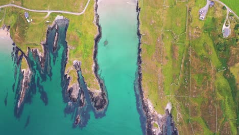 Aerial-view-in-4K-of-Cow-Strand-in-Sherkin-Island,-South-West-Cork,-Ireland