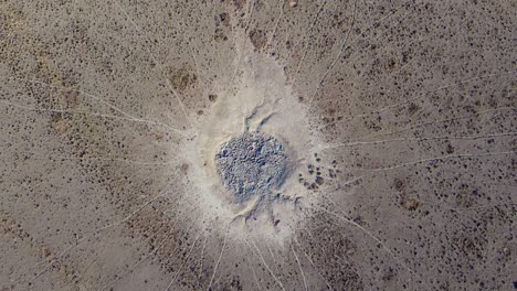 Aerial-view-of-a-dry-waterhole-with-game-trails-in-the-arid-kalahari-region-of-southern-Africa-2