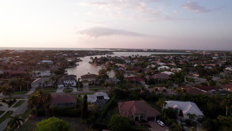 Aerial-over-Marco-Island-Flordia-beach-town-at-sunset