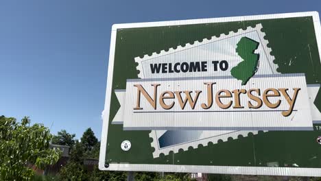 Welcome-to-New-Jersey-sign-with-video-panning-left-to-right