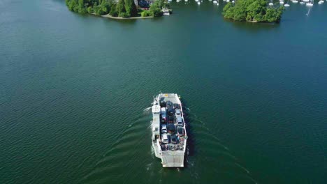 Aerial-Drone-View-Of-500-Year-Old-Car-Ferry-On-Lake-Windermere-From-Bowness-Nab-To-Far-Sawrey-On-Sunny-Summer-Morning-Showing-Algae-In-The-Lake