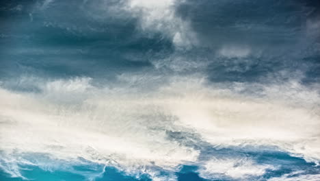 Low-angle-shot-of-white-clouds-movement-over-blue-sky-in-the-background-at-daytime-in-timelapse