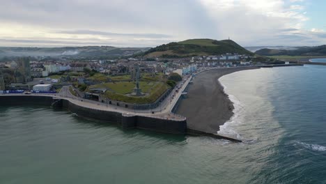 Drone-footage-on-a-summer-day-in-UK-Wales-Aberystwyth-around-the-beach,-harbour,-sea-side,-clif-and-town-front-20