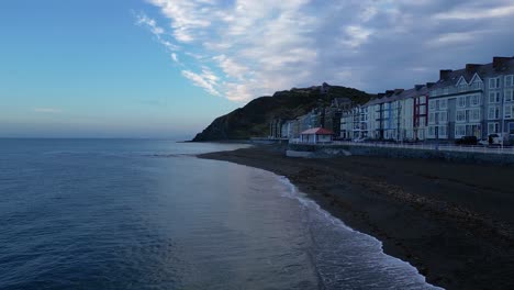 Drone-footage-on-a-summer-day-in-UK-Wales-Aberystwyth-around-the-beach,-harbour,-sea-side,-clif-and-town-front-25