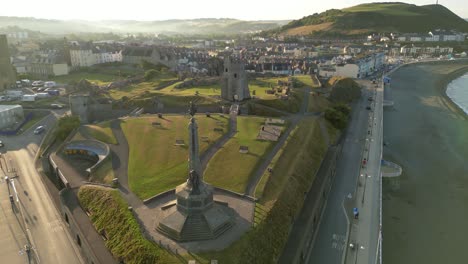 Drone-footage-on-a-summer-day-in-UK-Wales-Aberystwyth-around-the-beach,-harbour,-sea-side,-clif-and-town-front-4