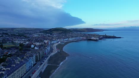 Drone-footage-on-a-summer-day-in-UK-Wales-Aberystwyth-around-the-beach,-harbour,-sea-side,-clif-and-town-front-23
