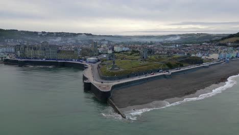 Drone-footage-on-a-summer-day-in-UK-Wales-Aberystwyth-around-the-beach,-harbour,-sea-side,-clif-and-town-front-21
