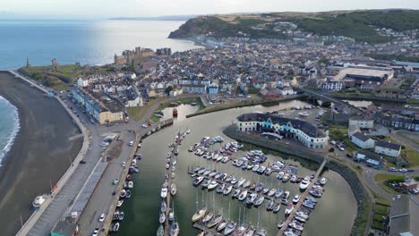 Drone-footage-on-a-summer-day-in-UK-Wales-Aberystwyth-around-the-beach,-harbour,-sea-side,-clif-and-town-front-16