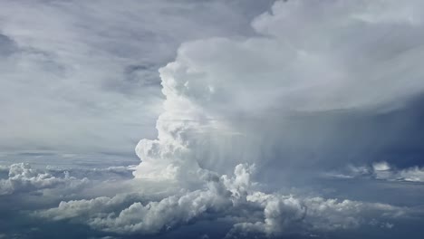 Dramatic-aerial-view-recorded-from-a-jet-cockpit-of-a-huge-and-very-actice-cumulonimbus-impossible-to-overfly