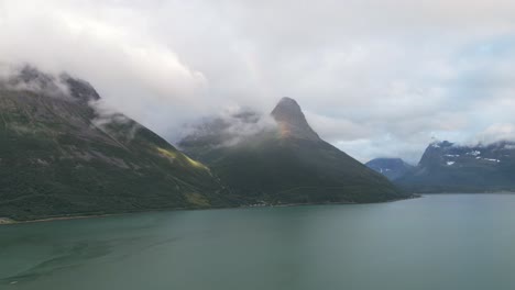 Aerial-hyperlapse-in-Norway-rainbow,-mountains-and-clouds-|-Dji-Air2