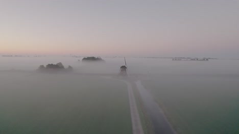 Dutch-windmill-on-foggy-morning