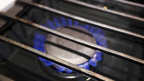 Gas-lighting-stove-to-prepare-for-dinner