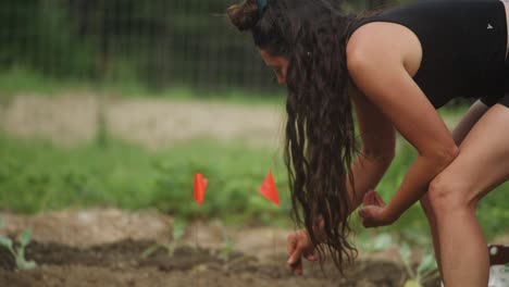 Woman-working-in-garden-at-farm