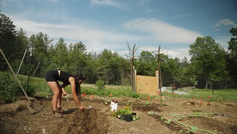 Girl-working-in-garden-at-rural-farm-homesteading