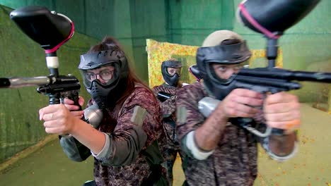 Girls-and-boys-playing-indoor-paintball-11