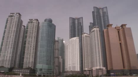 Pan-shot-of-shot-of-Haeundae-Marina-with-skyscrapers-in-South-Korea