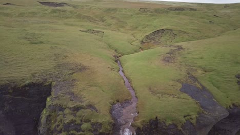 Arial-video-of-waterfall-near-Fossalar-in-Iceland