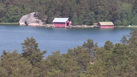 Lake-in-Finland-with-hut-and-coniferous-forest