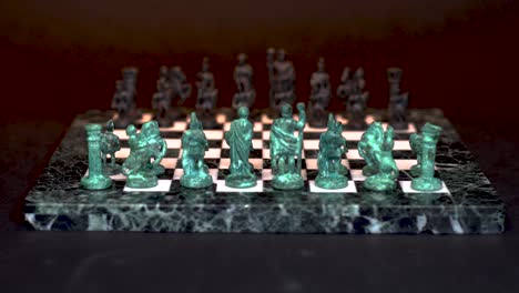 Ancient-marble-chessboard-with-teal-bronce-knights-as-pawns-slider-macro-5