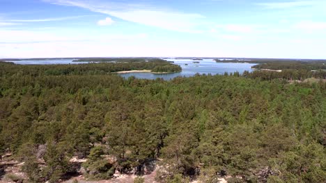 Pan-shot-of-finish-landscape-with-trees-and-archipelagos