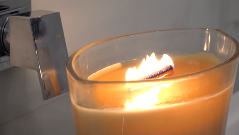 Tight-shot-of-lighting-a-candle