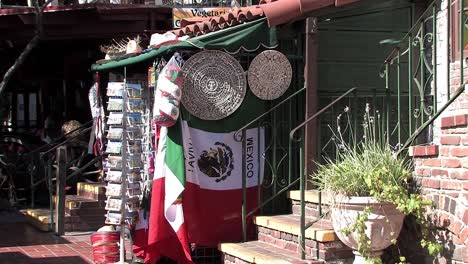Shop-with-mexican-flag-in-pueblo,-downtown-Los-Angeles,-California,-USA