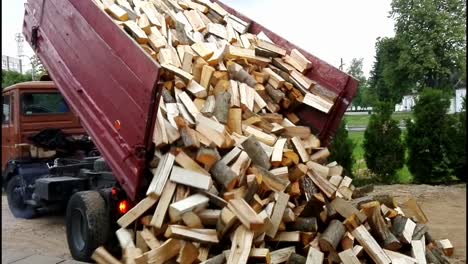 Pouring-Chopped-Firewood-From-A-Dump-Trailer
