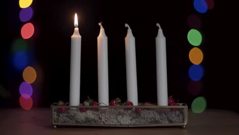 One-advent-candle-burning