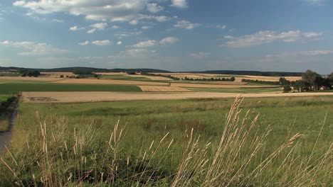 Beautiful-panorama-shot-over-fields-in-Bavaria-near-Mendorf-in-summer,-Germany-2