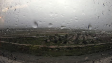 View-from-a-moving-train-window-in-the-rain