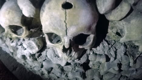 Closeup-of-stacks-of-skulls-in-Catacombs