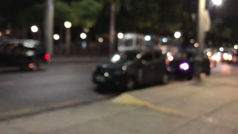 Blurred-scene-of-cars-passing-by-in-a-low-traffic-street-in-Guayaquil,-Ecuador