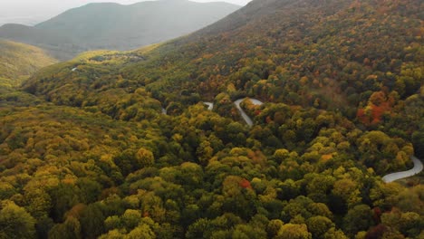 Drone-footage-of-twisty-mountain-road-in-autumn---12