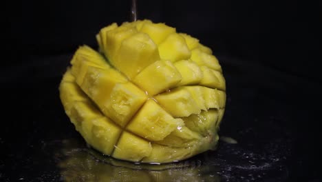 Halved-And-Chopped-Mango-With-Water-Splashing-1