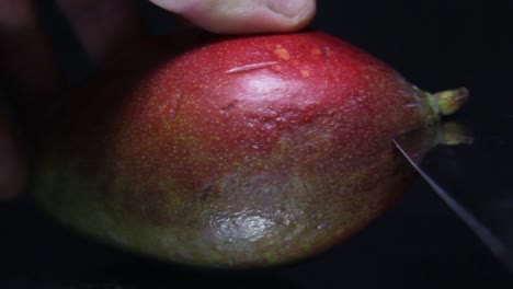 Cutting-mango-in-a-half