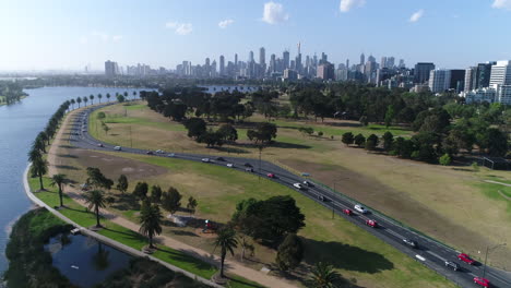 Gliding-over-Lakeside-Drive,-Albert-Park-Melbourne