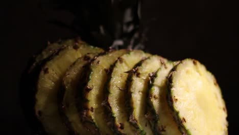 Juicy-Fresh-Pineapple-Ananas-Slices-in-a-Dark