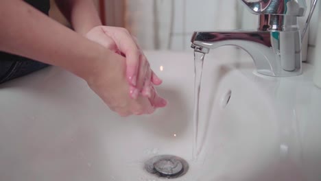 A-female-washing-her-hands-in-slowmotion-2