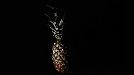 Sweet-Comosus-Pineapple-Ananas-Turning-On-a-Black-Background-3