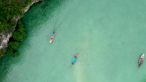 Drone-footage-of-Hong-island-lagoon-with-boats-navigating-trough-9