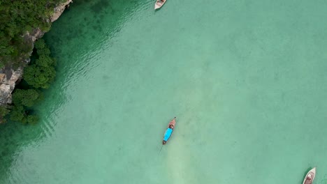 Drone-footage-of-Hong-island-lagoon-with-boats-navigating-trough