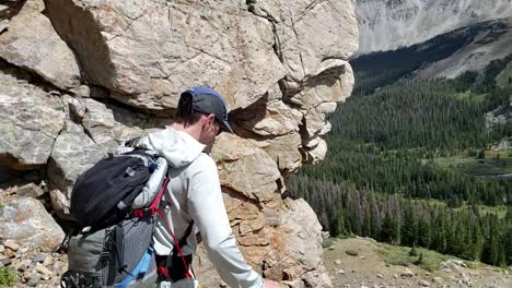 Guy-in-shoes-running-down-scree-in-Colorado