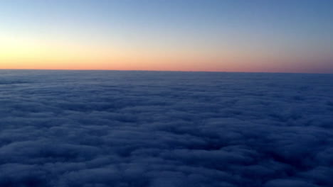 Sunrise-and-clouds,-view-from-a-plane-1
